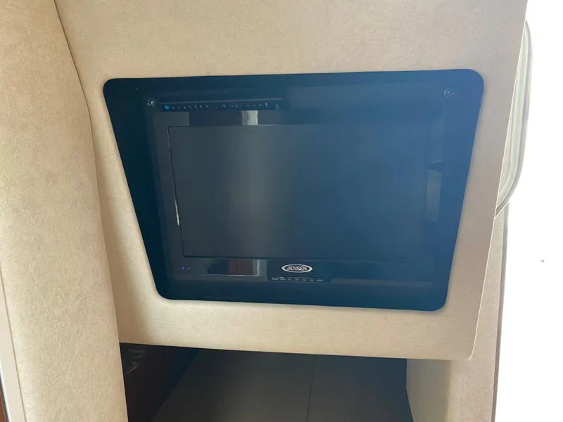 Slide: The Image of Interior TV in a 2012 Sea Ray Sundancer 280 boat. - 24
