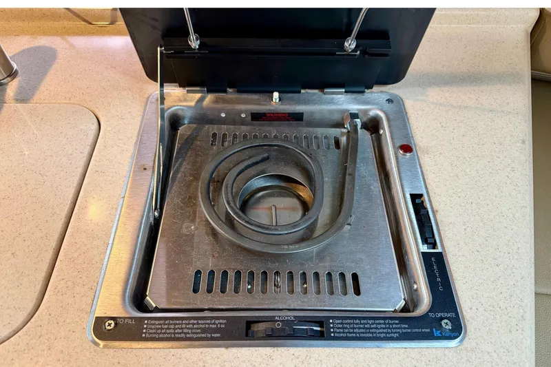 Slide: The Image of Stove on 2012 Sea Ray Sundancer 280 yacht, featuring a single burner and sleek design. - 35