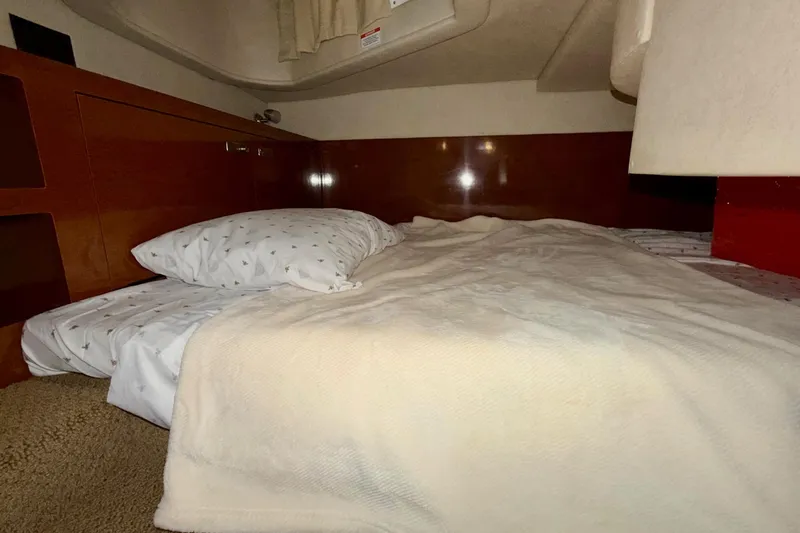 Slide: The Image of Cozy cabin bed in 2012 Sea Ray Sundancer 280 yacht interior. - 37