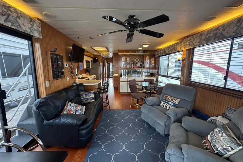 Slide: The Image of Luxurious 1993 Sumerset 14x65 houseboat interior with cozy seating and modern amenities. - 2