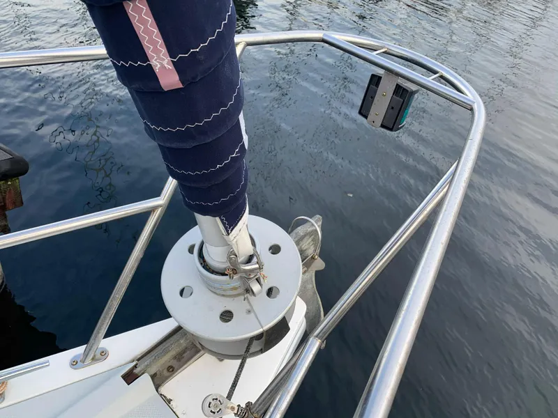 Slide: The Image of Bow of a 1992 Catalina 42 sailboat by the water. - 20
