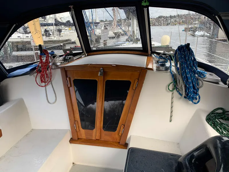 Slide: The Image of Interior of a 1992 Catalina 42 sailboat docked at a marina. - 23