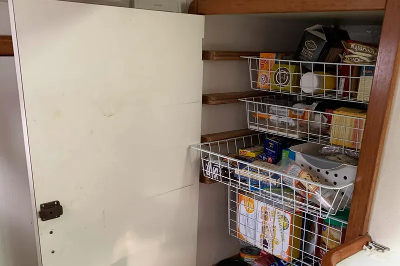 Slide: The Image of Pantry storage on Catalina 42 sailboat, year 1992. - 32