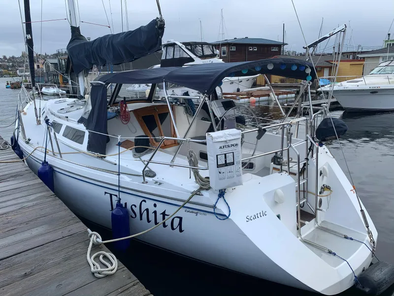 Slide: The Image of 1992 Catalina 42 sailboat docked at marina. - 4