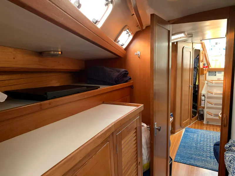 Slide: The Image of Interior of a 1992 Catalina 42 yacht with wooden furnishings. - 42