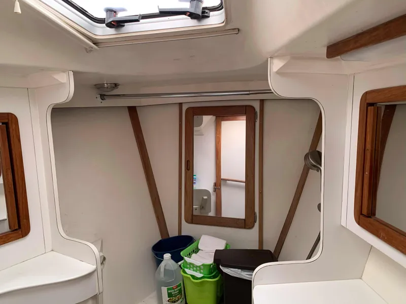 Slide: The Image of Interior of a 1992 Catalina 42 yacht with wood trim. - 43