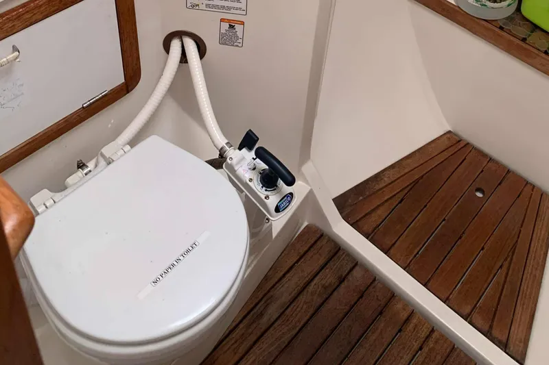 Slide: The Image of Interior of a 1992 Catalina 42 yacht with toilet. - 44