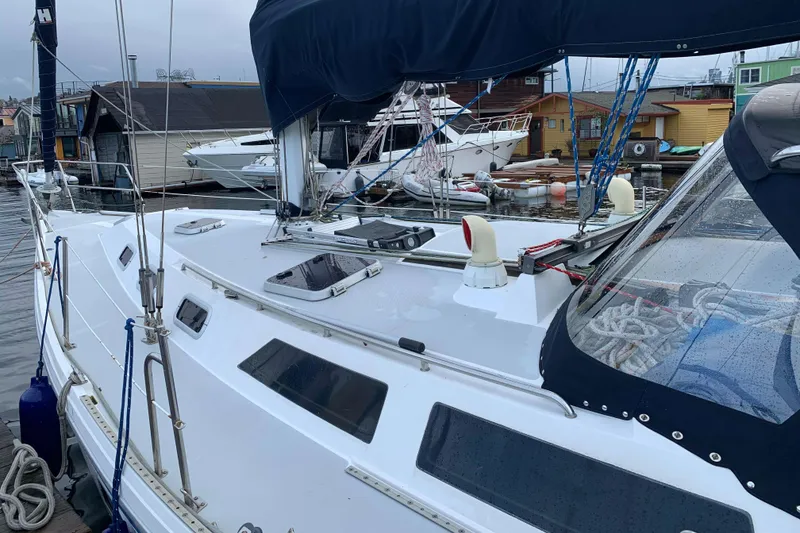 Slide: The Image of 1992 Catalina 42 sailboat docked at marina. - 6
