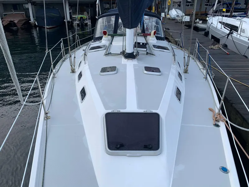 Slide: The Image of Deck of a 1992 Catalina 42 yacht docked at marina. - 8