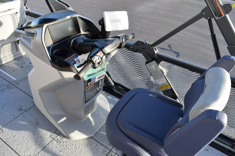 Slide: The Image of 2026 Sea-Doo Switch Cruise Limited 21 dashboard and seating area, featuring modern controls and design. - 12