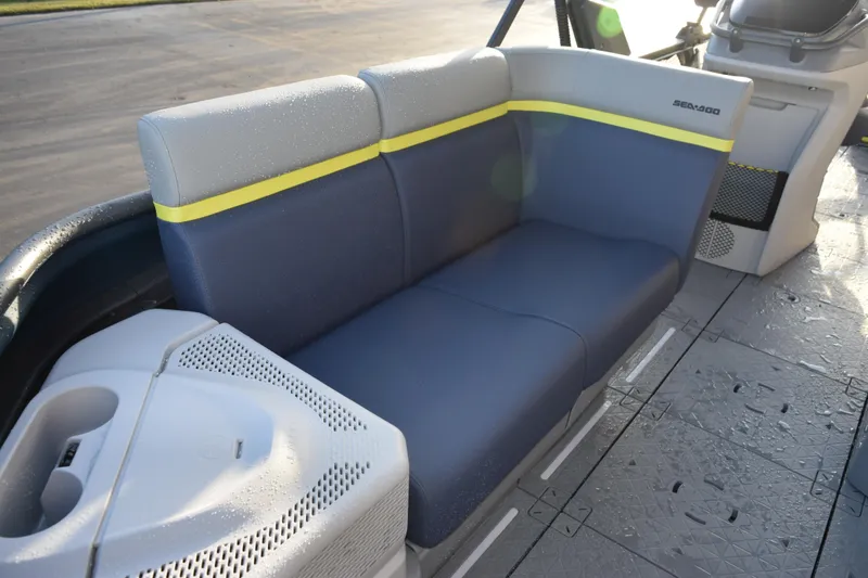 Slide: The Image of 2026 Sea-Doo Switch Cruise Limited 21 boat interior with blue and gray seating. - 7