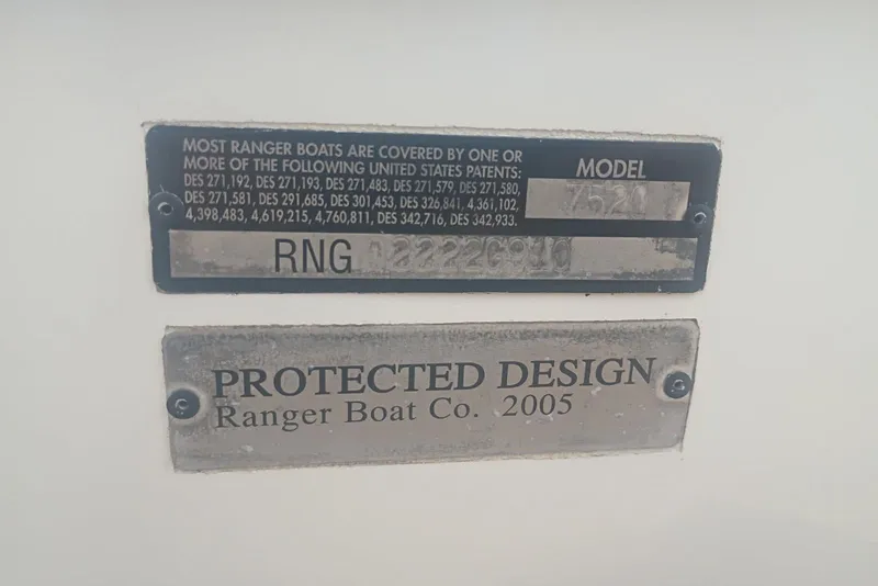 Slide: The Image of 2010 Ranger 520 VX/VS boat patent and design plates, highlighting model and protection details. - 12