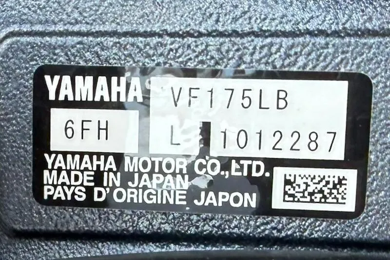 Slide: The Image of Yamaha engine label with model VF175LB, made in Japan, on textured surface. - 14