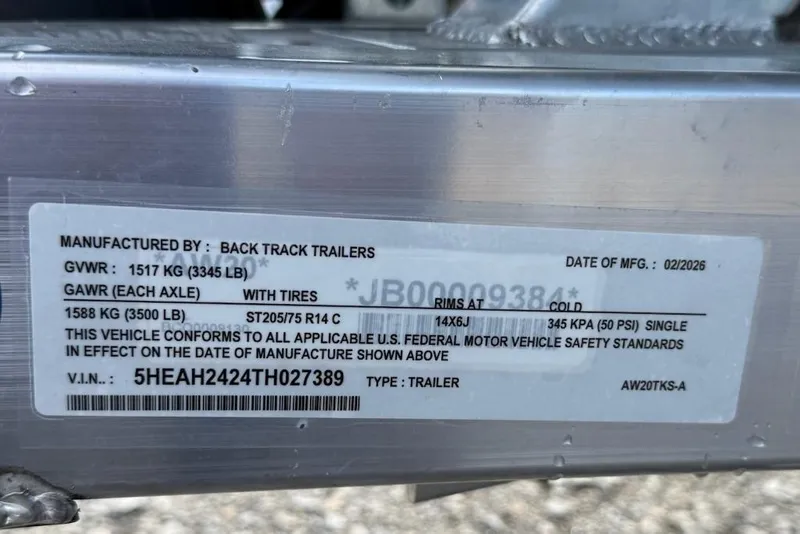 Slide: The Image of Label on trailer showing specifications and compliance details, manufactured by Back Track Trailers, February 2026. - 15