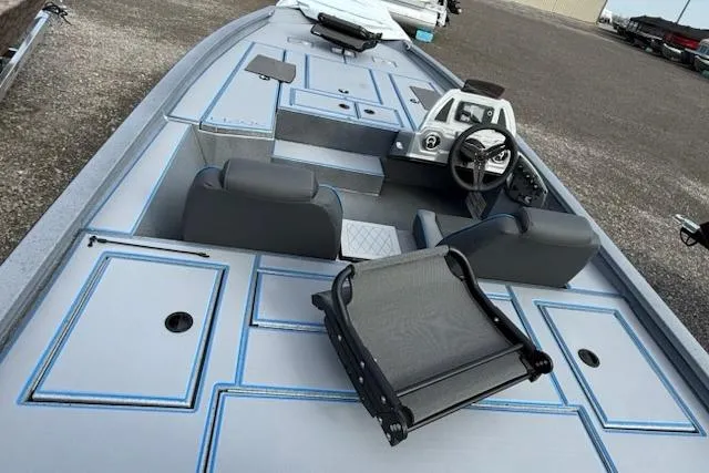Slide: The Image of 2026 Express H20C boat interior with modern seating and steering console. - 4