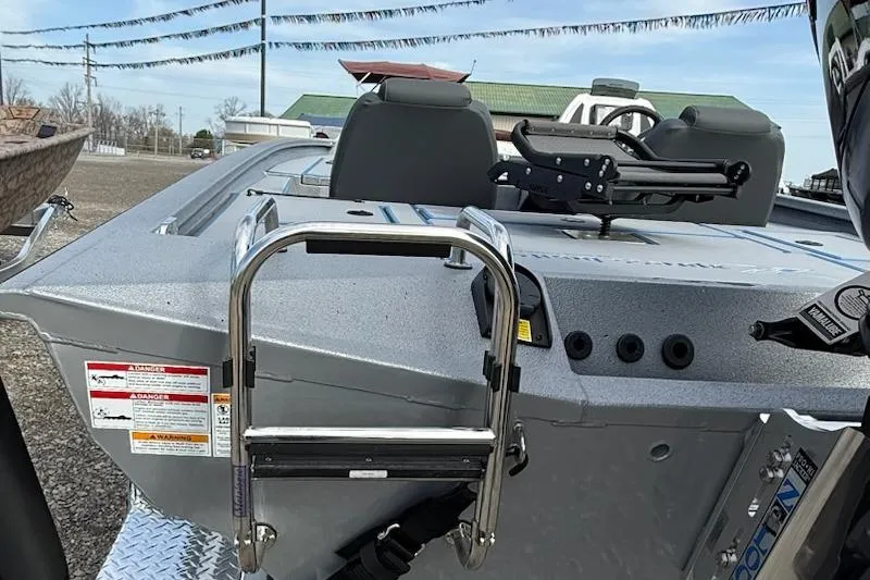 Slide: The Image of 2026 Express H20C boat with ladder and seating, displayed outdoors. - 9