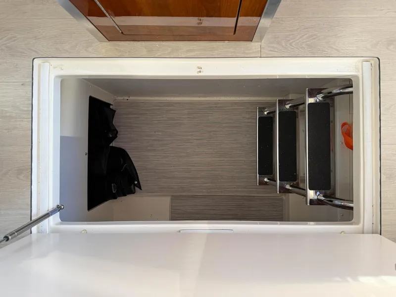 Slide: The Image of Hatch with steps in 2016 Carver C37 Coupe interior. - 41