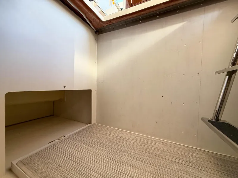 Slide: The Image of Interior cabin space of 2016 Carver C37 Coupe, featuring minimalist design and natural light. - 43