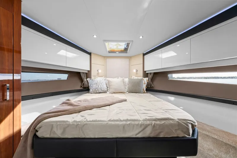Slide: The Image of Luxurious interior of 2016 Carver C37 Coupe yacht with elegant bedroom design. - 46