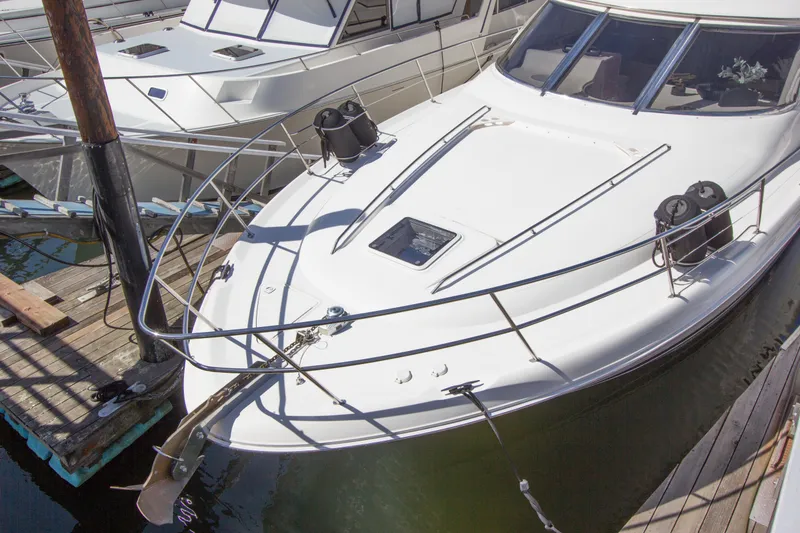Slide: The Image of 1998 Sea Ray 480 Sedan Bridge yacht docked at marina, top view. - 33