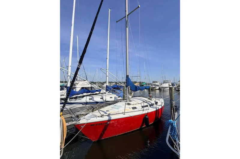 Slide: The Image of Vintage bell and barometer on 1981 Catalina 30 sailboat interior. - 35
