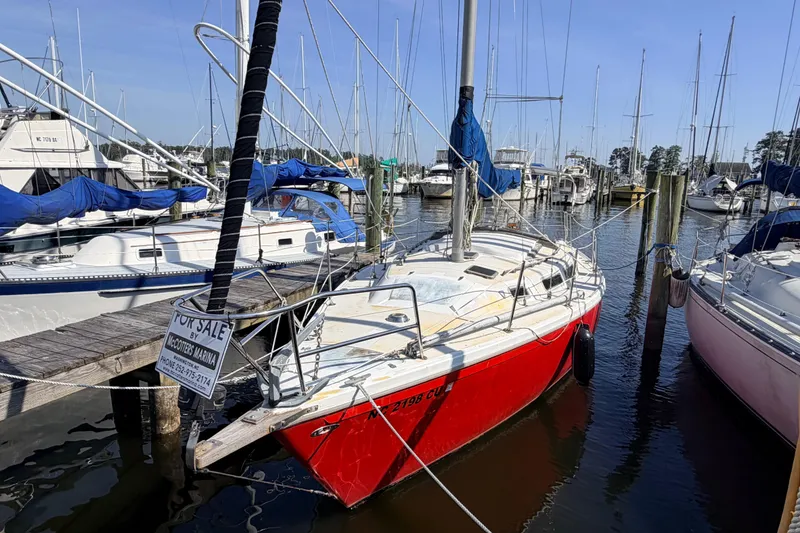 Slide: The Image of Control panel of a 1981 Catalina 30 yacht with switches and gauges. - 36