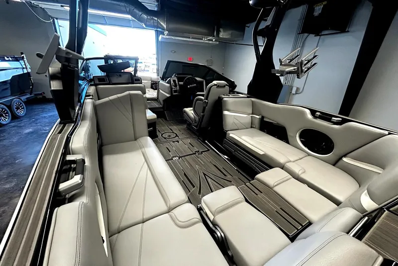 Slide: The Image of 2023 Supra SA 450 boat interior with luxurious seating and modern design. - 4