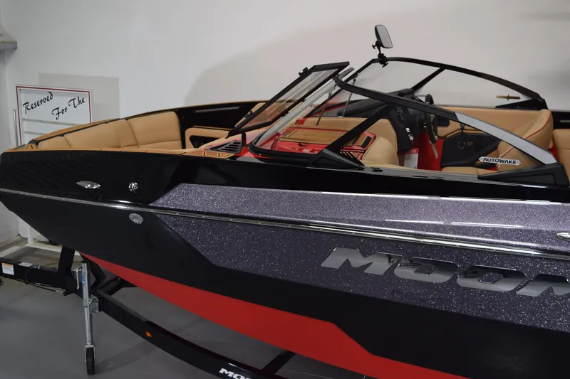 Slide: The Image of 2026 Moomba Max boat with sleek design and luxurious interior. - 1