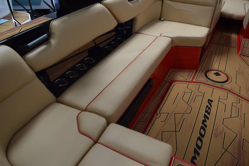 Slide: The Image of Luxurious interior of 2026 Moomba Max boat with beige seating and stylish flooring. - 12