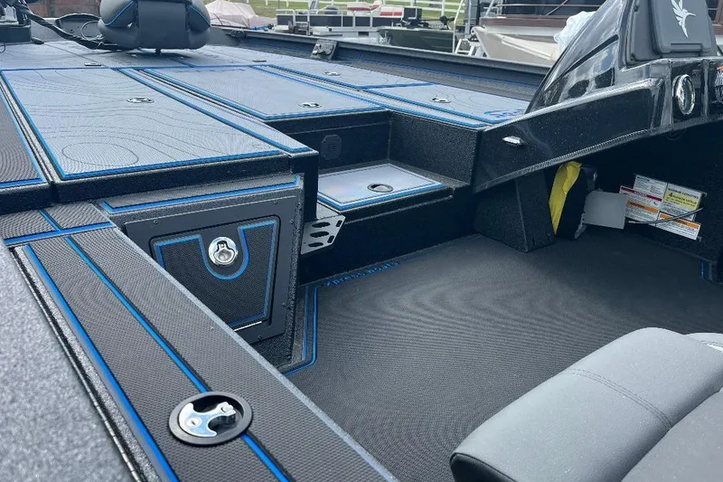 Slide: The Image of 2026 Xpress XR21 Bass boat interior with sleek storage compartments and modern design. - 16