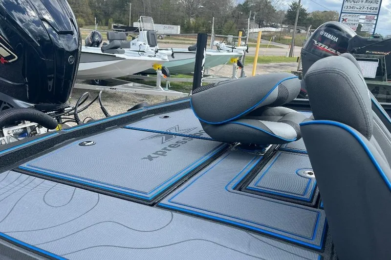 Slide: The Image of 2026 Xpress XR21 Bass boat interior with sleek seating and modern design. - 18
