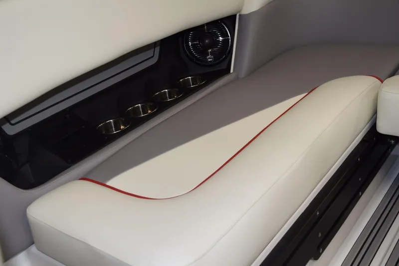 Slide: The Image of 2026 Moomba Craz boat interior with cushioned seating and cup holders. - 14