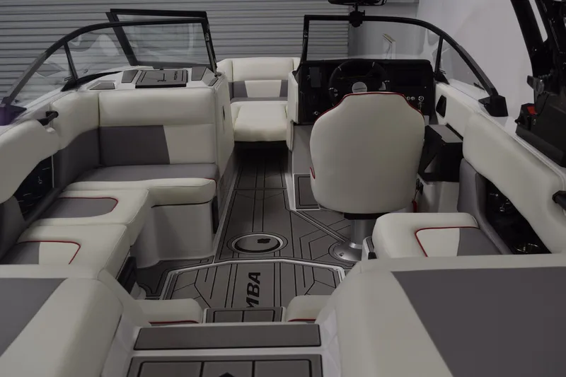 Slide: The Image of 2026 Moomba Craz boat interior with white and gray seating, modern design. - 6