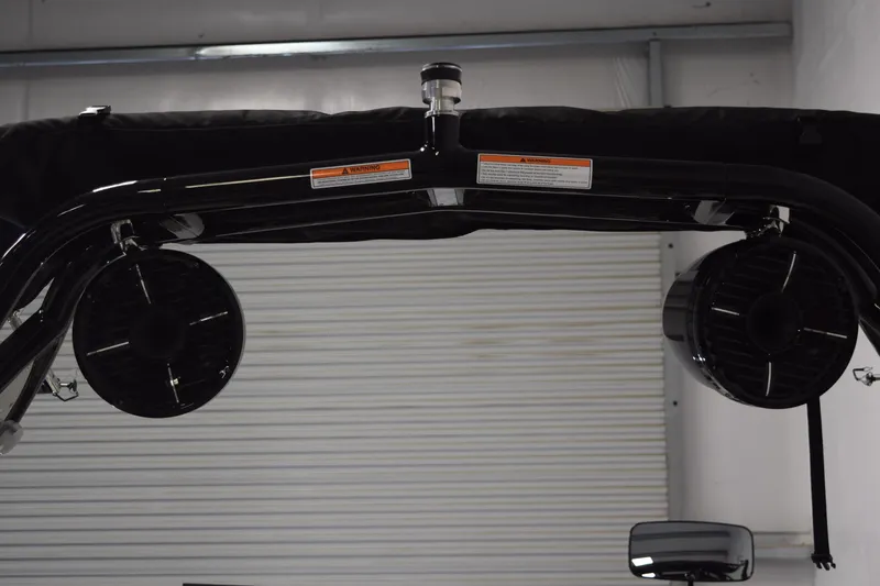 Slide: The Image of 2026 Moomba Craz boat speakers and tower in a garage setting. - 7