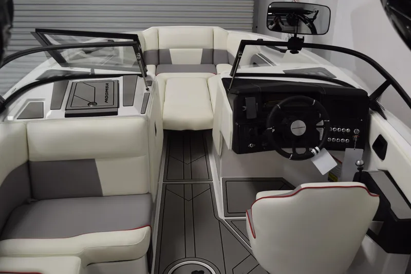 Slide: The Image of 2026 Moomba Craz boat interior with modern dashboard and seating. - 9