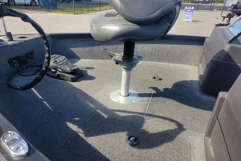 Slide: The Image of 2022 Tracker Pro Guide V-175 Combo boat interior with swivel seat and foot pedal. - 15