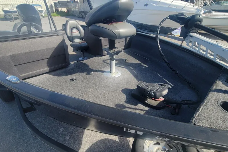 Slide: The Image of 2022 Tracker Pro Guide V-175 Combo boat interior with seating and equipment. - 5