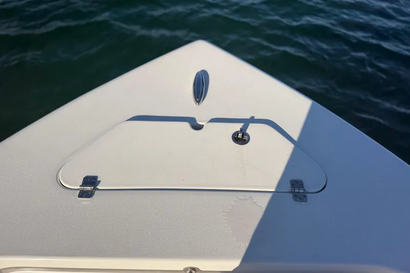Slide: The Image of Bow of 2023 Sea Pro 239 Center Console boat on water. - 33
