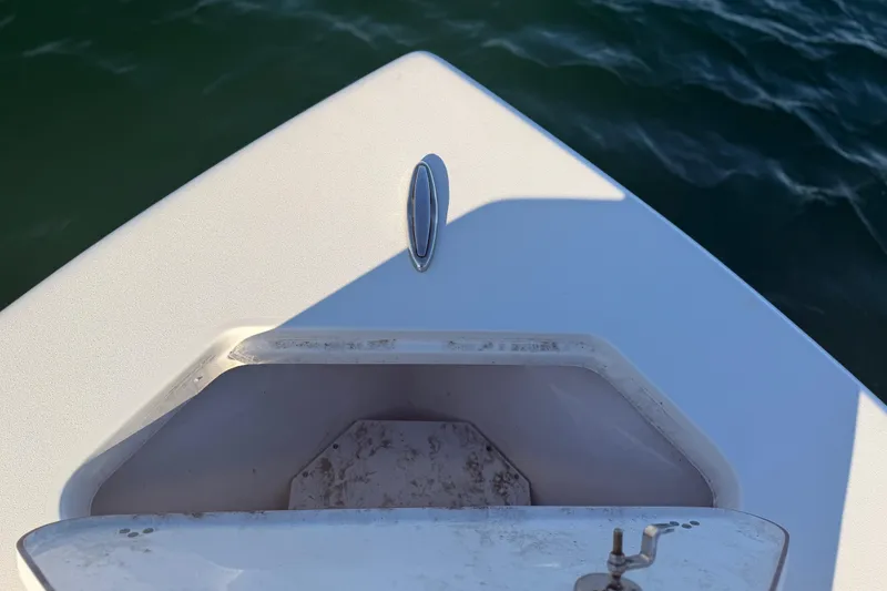 Slide: The Image of Bow of 2023 Sea Pro 239 Center Console boat on water. - 40