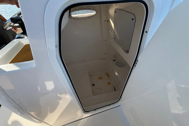 Slide: The Image of 2023 Sea Pro 239 Center Console boat interior storage compartment. - 59