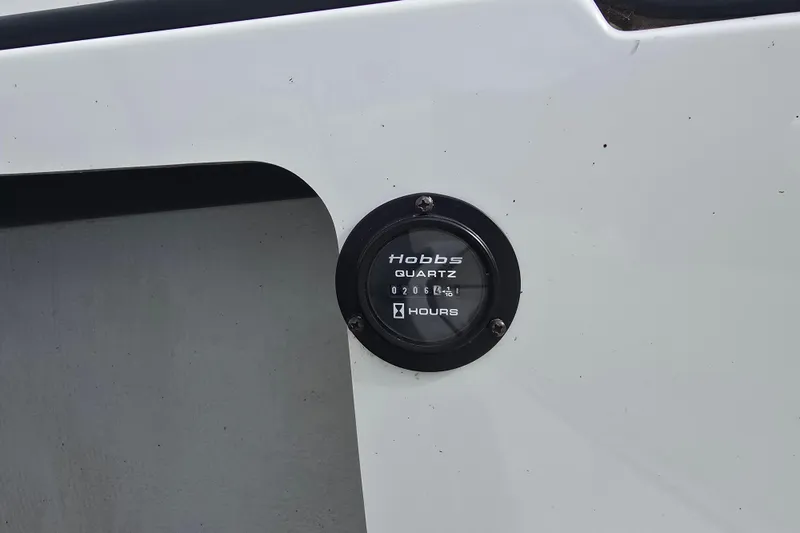 Slide: The Image of Hour meter on 2007 Cobalt 212 boat, displaying usage hours. - 10