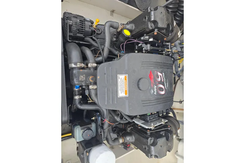 Slide: The Image of 2007 Cobalt 212 boat engine, featuring MerCruiser 5.0 MPI components. - 11