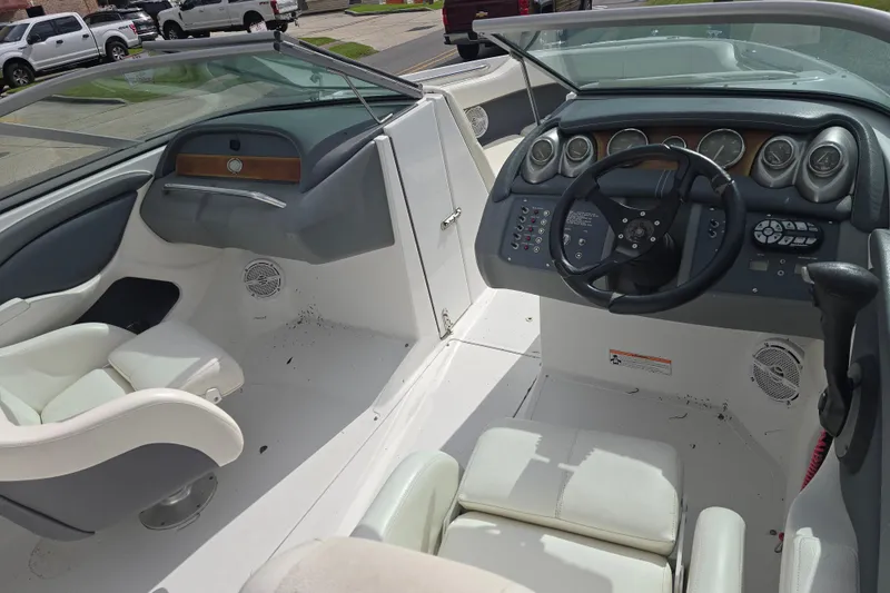 Slide: The Image of 2007 Cobalt 212 boat interior with steering wheel and dashboard controls. - 6