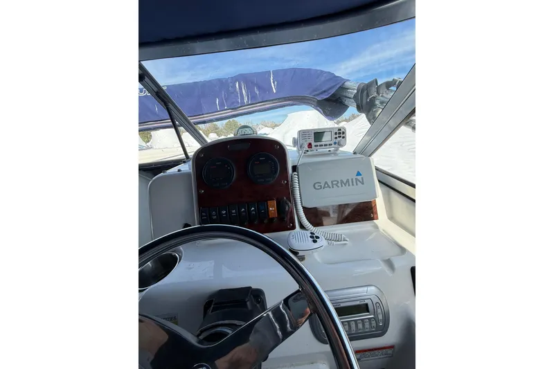 Slide: The Image of 2011 Sea Hunt Escape 220 LE boat dashboard with Garmin navigation system. - 15