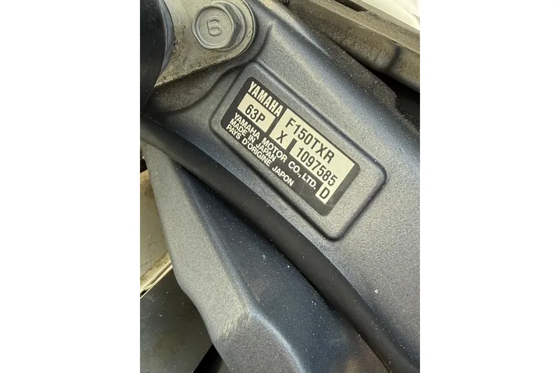 Slide: The Image of Close-up of Yamaha F150TXR engine label on 2011 Sea Hunt Escape 220 LE. - 25