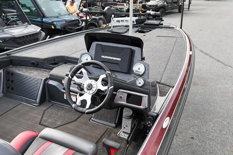Slide: The Image of 2025 Nitro Z20 XL Pro boat dashboard with steering wheel and Humminbird electronics. - 10