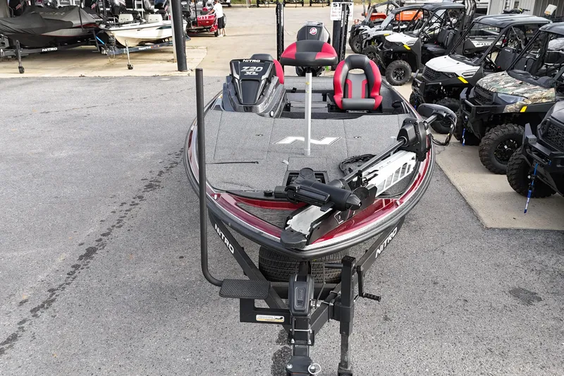 Slide: The Image of 2025 Nitro Z20 XL Pro fishing boat displayed at dealership. - 5