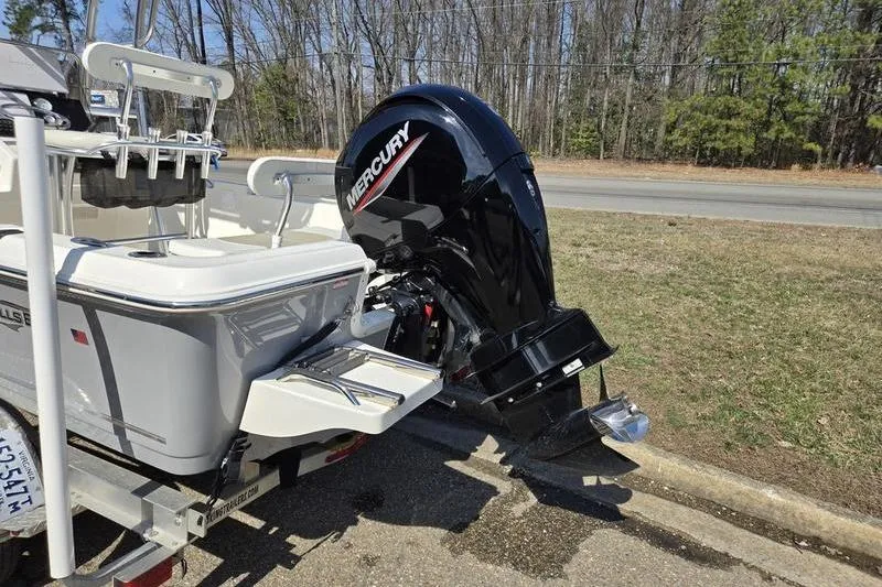 Slide: The Image of 2022 Bulls Bay 2200 boat with Mercury outboard motor on a trailer. - 8