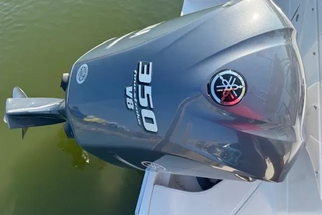 Slide: The Image of Yamaha 350 V8 outboard motor on 2015 Pursuit DC 265 Dual Console boat. - 13