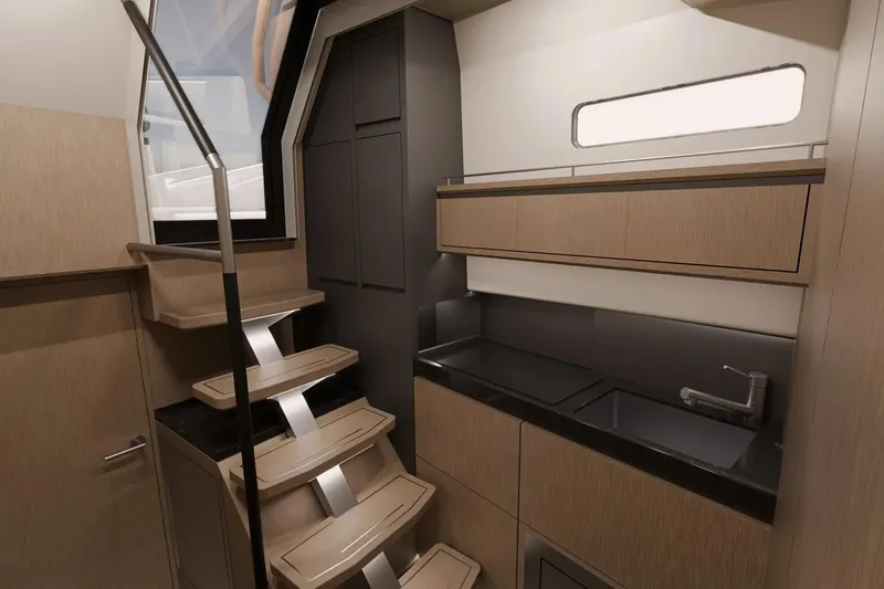 Slide: The Image of Modern interior of Aiata Sunfinder 50 yacht, featuring sleek kitchen and staircase, 2026 model. - 4